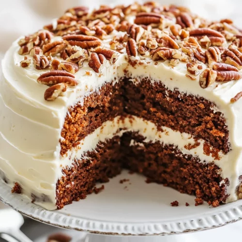 Easy Carrot Cake With Cream Cheese Frosting: A Classic Dessert For Any Occasion 3 Two-Layer Easy Carrot Cake With Cream Cheese Frosting On A White Cake Stand, Garnished With Chopped Pecans And Piped Cream Swirls.