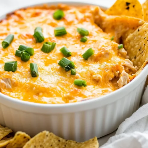 Irresistible Slow Cooker Buffalo Chicken Dip Recipe You'Ll Love 3 Creamy Slow Cooker Buffalo Chicken Dip Topped With Green Onions In A White Bowl Beside Tortilla Chips